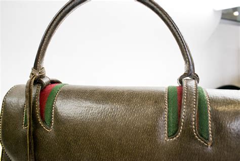 vintage gucci fiocchi purse price|vintage gucci leather bags value.